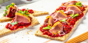 Smoked Duck on black pepper flatbread, BC Raspberry compote appetizer