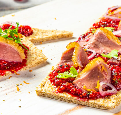 Smoked Duck on black pepper flatbread, BC Raspberry compote appetizer